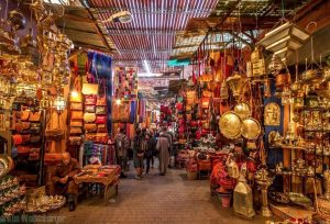 shopper wander a souk in marrakech
