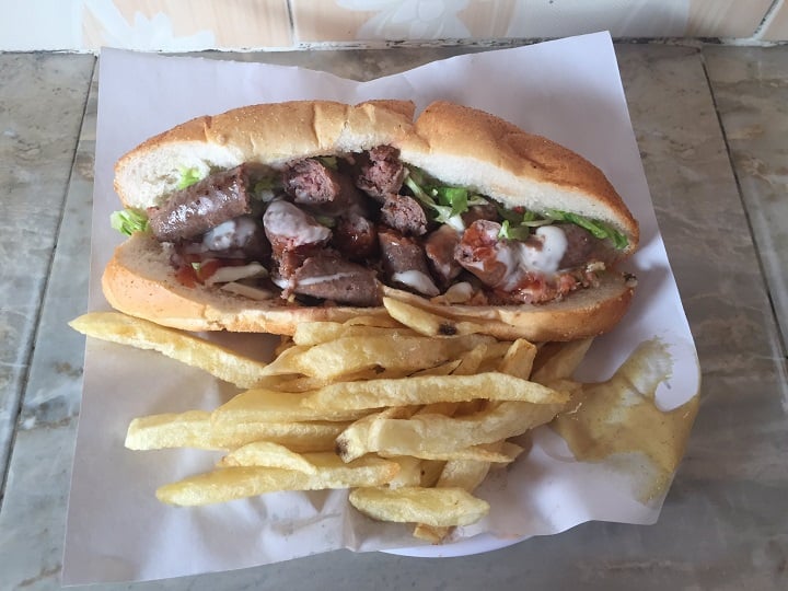 local sausage sandwich with fries marrakech