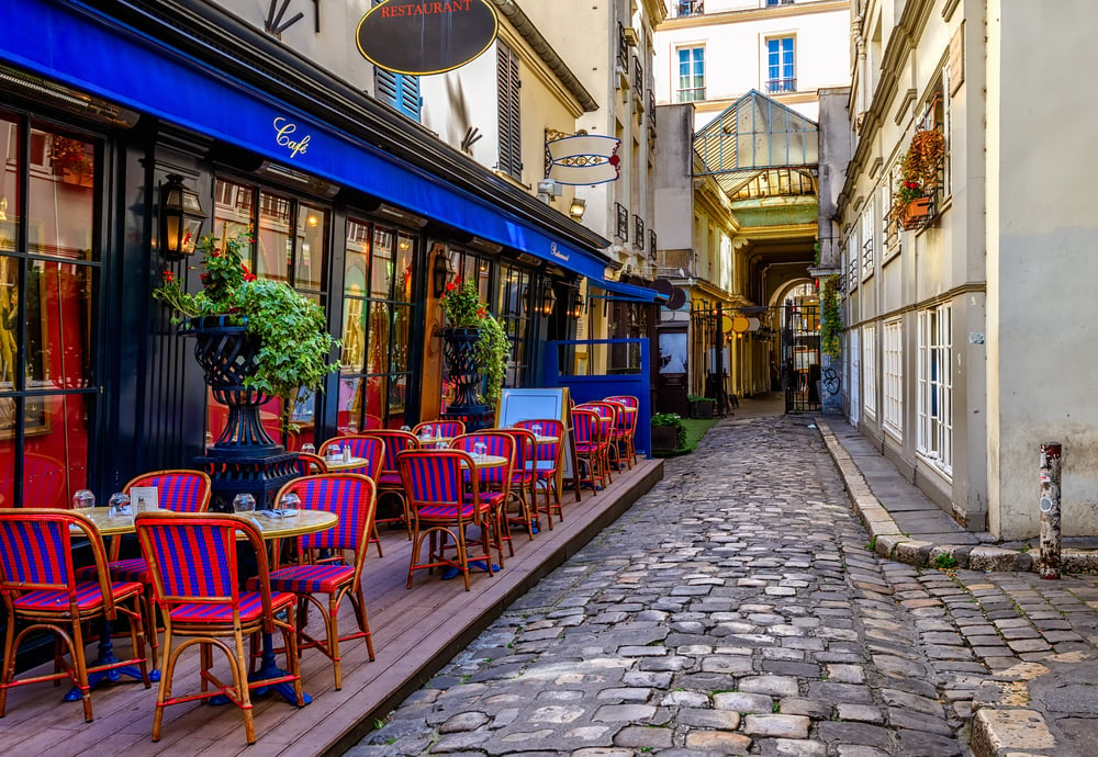 Side street with a typical cafe in Paris