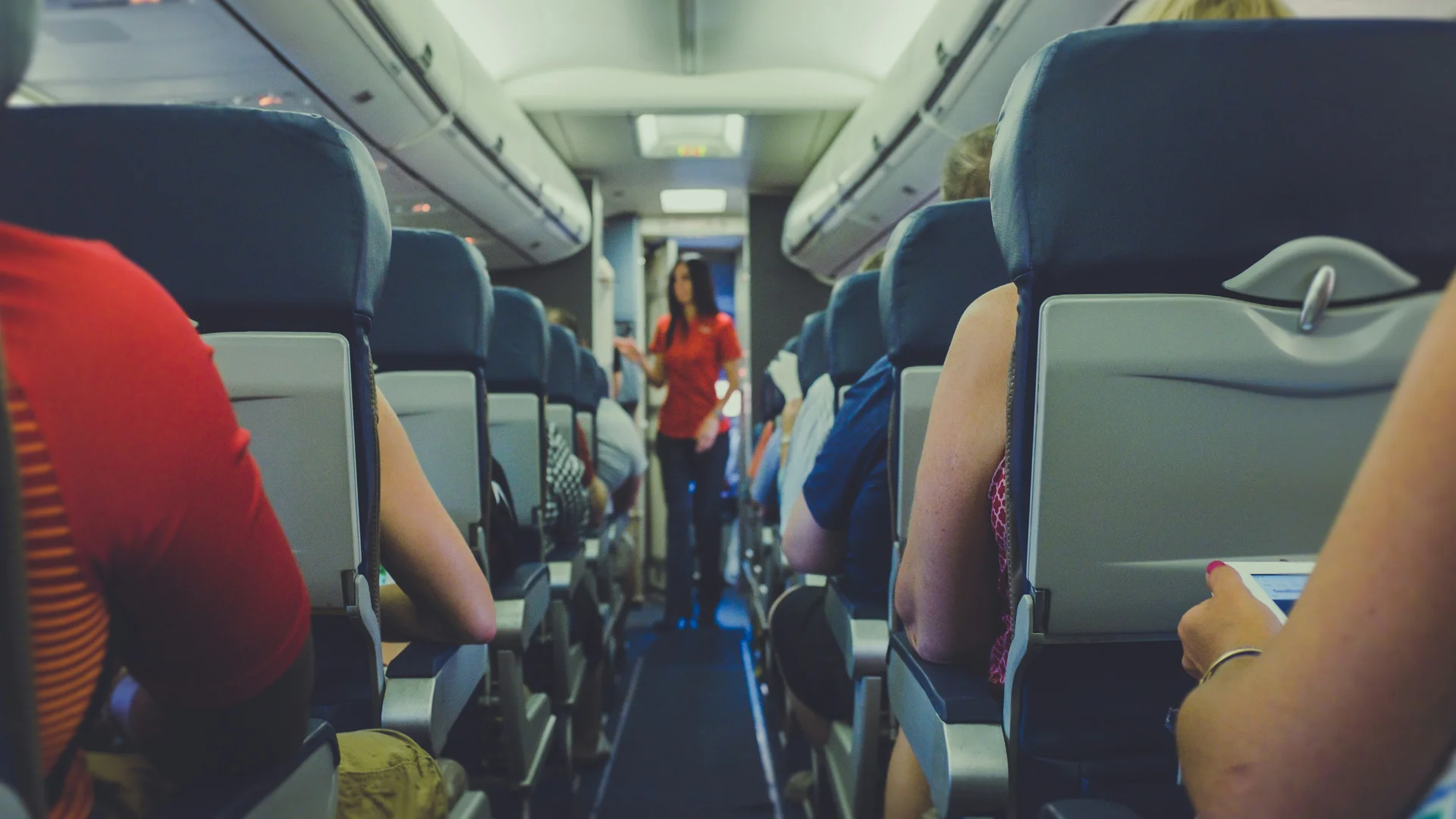 A family sitting together on a Ryanair flight.