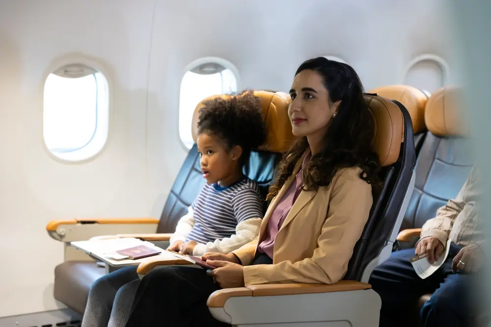 Reclining an airplane seat carefully